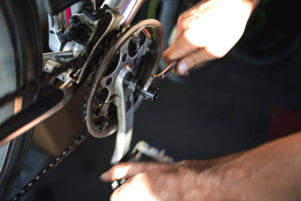 istock Fixing the bicycle problem in workshop stock photo 1174522583