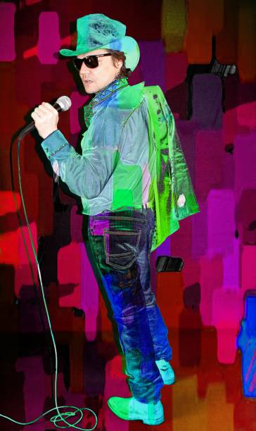 istock Cool country singer in a hat with a microphone, singing on a colorful backdrop. 1174522693