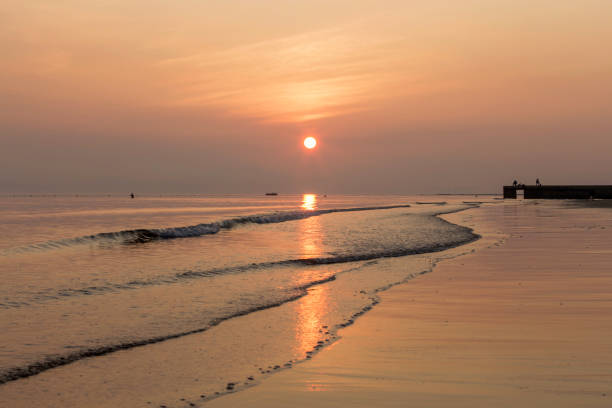 istock Sunrise on the beach in summer 1174533497