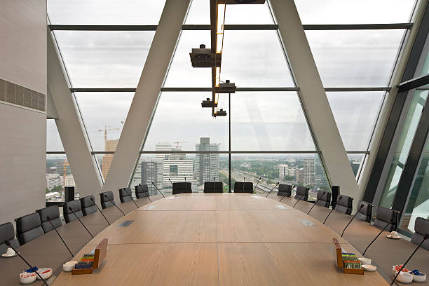 Wide view of an empty office board room stock photo
