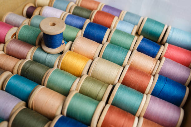 rolls of colorful threads, close-up and top view. home set for clothes repair, colorful thread