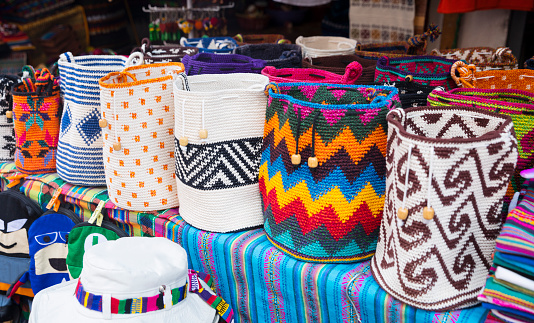 October 30, 2021. Panajachel, Sololá, Guatemala.  a small stall of Guatemalan handicrafts with beautiful colors and patterns in a local market.