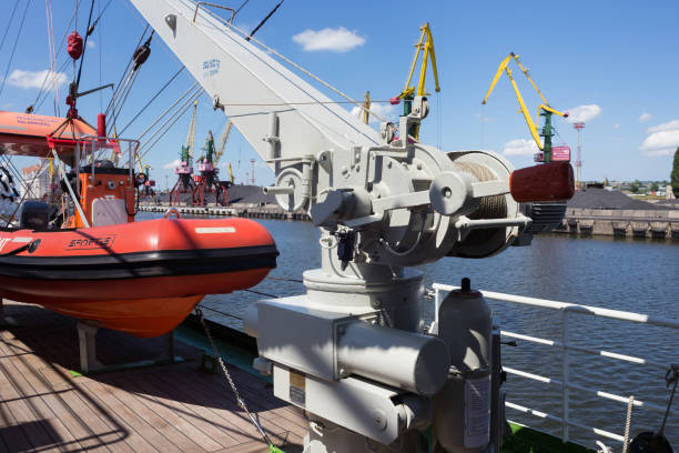 Rescue boat on the famous barque Kruzenshtern (prior Padua) moored in the Kaliningrad Sea Port. The ship launched in 1926 and was surrendered to the USSR in 1946. KALININGRAD, RUSSIA - JUNE 19, 2016: Rescue boat on the famous barque Kruzenshtern (prior Padua) moored in the Kaliningrad Sea Port. The ship launched in 1926 and was surrendered to the USSR in 1946. krusenstern stock pictures, royalty-free photos & images