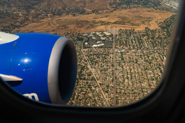 istock Airplane Passengers View Of The Jet Engine And Wing 1174549509