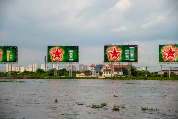 commericial signs on the mekong river delta - developing countries urban scene outdoors horizontal imagens e fotografias de stock