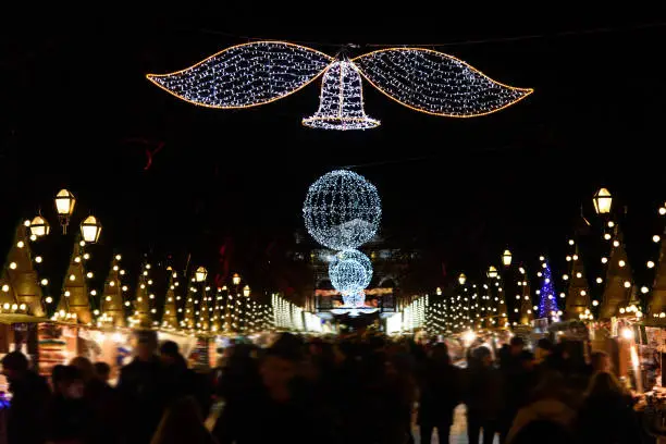 Photo of beautiful amazing decorated city center for christmas holidays in winter with lights in the evening