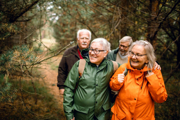 istock Seniors hiking through the foerst 1174556970