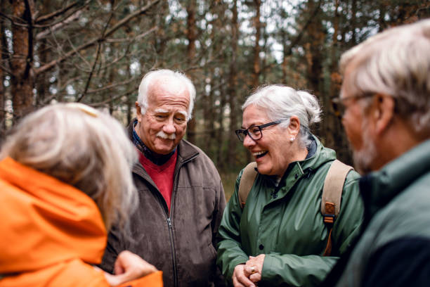 istock Seniors hiking through the foerst 1174558923