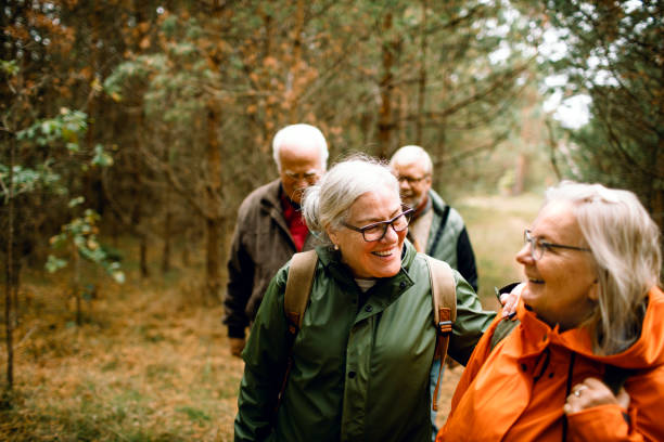 istock Seniors hiking through the foerst 1174559884