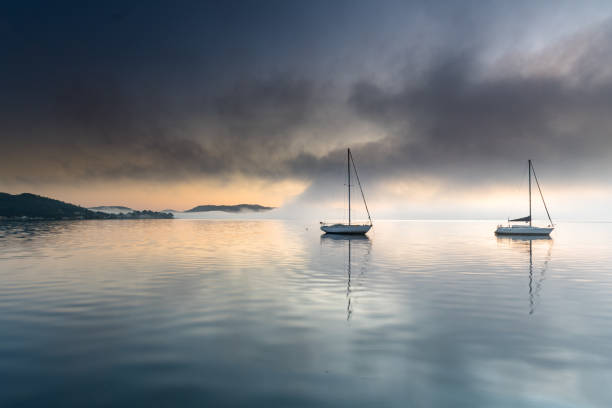 istock Misty Morning on the Bay with Boats 1174564273