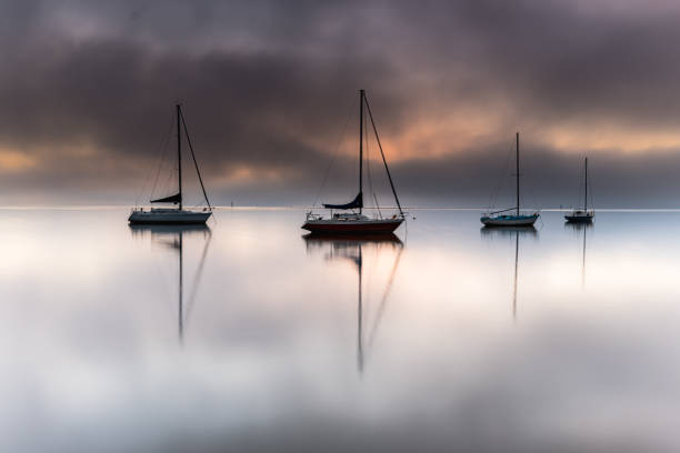 istock Misty Morning on the Bay with Boats 1174564357