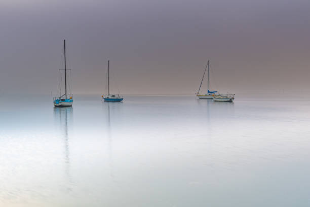 istock Misty Morning on the Bay with Boats 1174564435