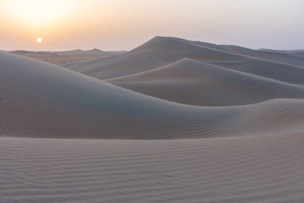 istock Sunrise in the arabic sand desert 1174566803