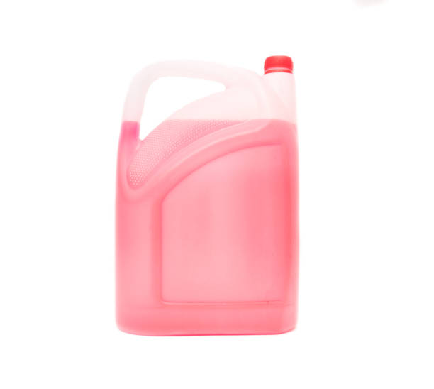 istock Canister with red antifreeze on a white background, isolate, coolant, close-up 1174570023