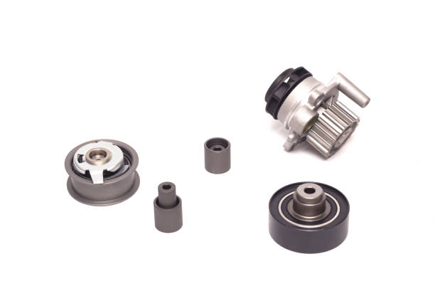 istock Set of rollers of the automobile engine timing system and the cooling pump on a white background, motor cars 1174571235