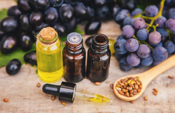 istock Grape seed oil in a small bottle. Selective focus. 1174572815