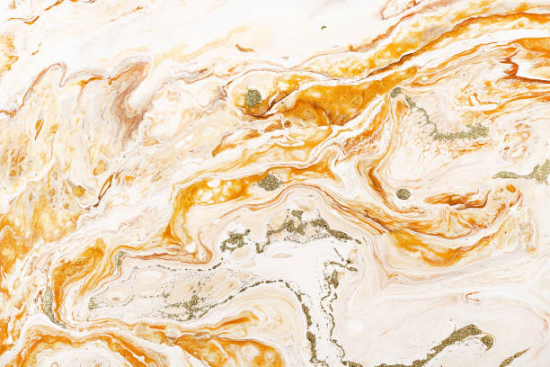 istock Marble golden and white raster texture. Mineral stone macro surface. Color liquid flow, fluid effect wallpaper. 1174574854