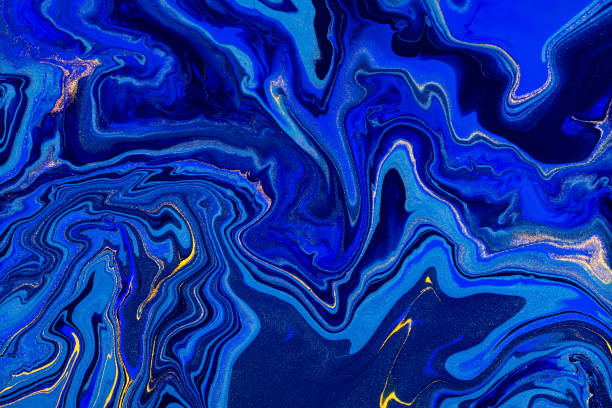 istock Hand painted background with mixed liquid blue and golden paints. Abstract fluid acrylic painting. Modern art. Marbled blue abstract background. Liquid marble pattern 1174574870