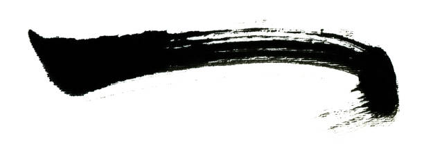 istock Black color paint with brush stroke isolated on white background 1174585955