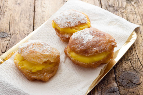 istock Handmade krapfen filled with pastry cream 1174588859