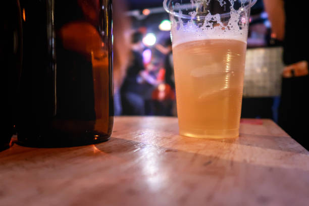 istock Draft beer.  Enjoying Evening Drinks at the pub party in a nightclub . 1174592099