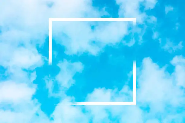 Vector illustration of Abstract vector design template for a quote, blue sky background with white clouds and a square frame, a texture with a place for text and logo