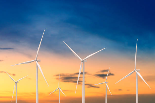 istock Windmill for electric power generating electricity on at sunset sky. 1174598543