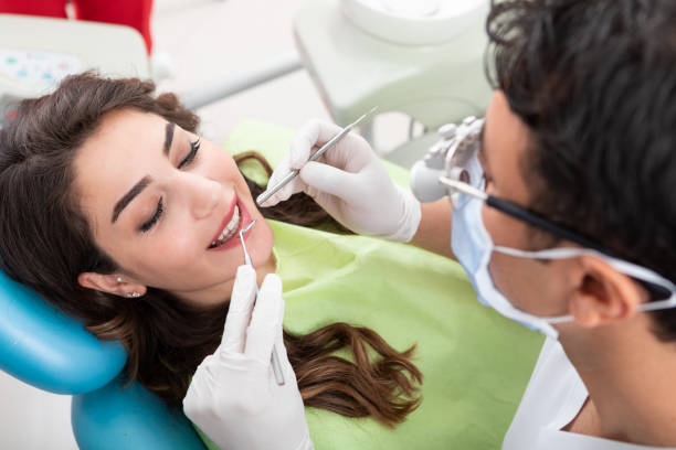 istock Young Woman Having Dental Inspection 1174599854