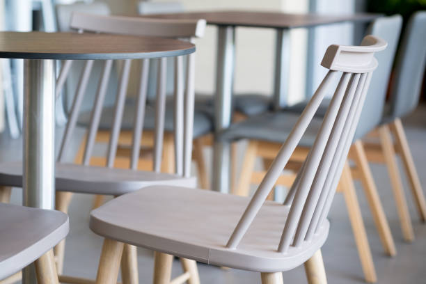 istock Set of table and chairs in cafe, close up 1174599907