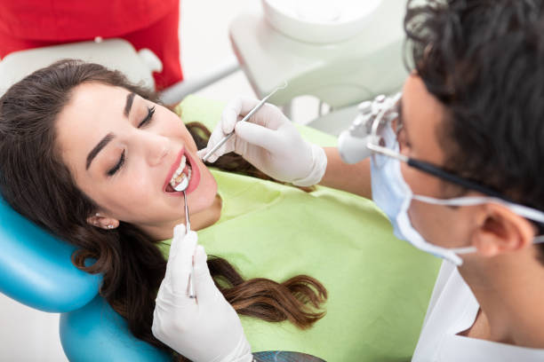 istock Young Woman Having Dental Inspection 1174600701