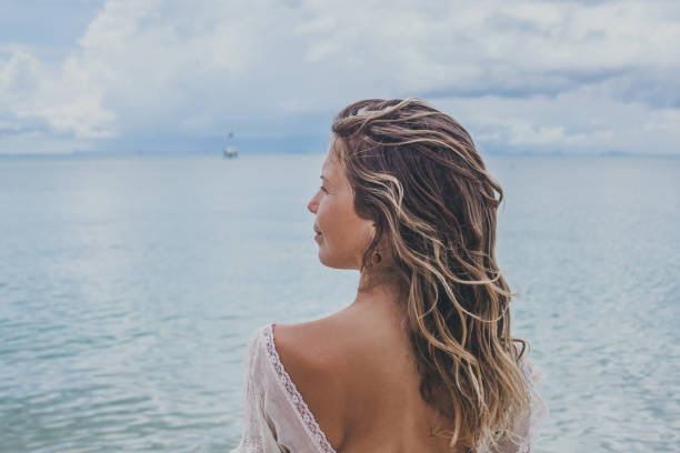 Dreamy girl on beach