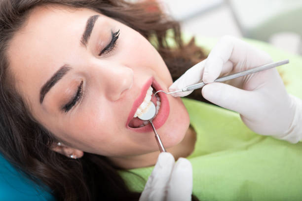 istock Young Woman Having Dental Inspection 1174601103