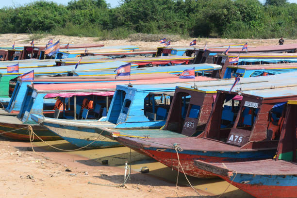 istock boats with flags on tonle sap lake cambodia 1174601152