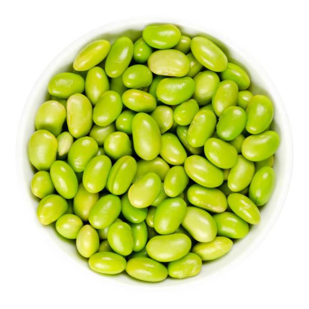 edamame. green soybeans in white bowl - edamame imagens e fotografias de stock