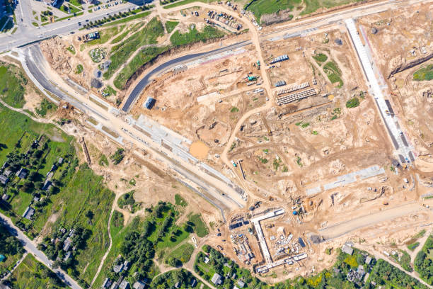 istock aerial top view of road construction site at suburb district 1174602860