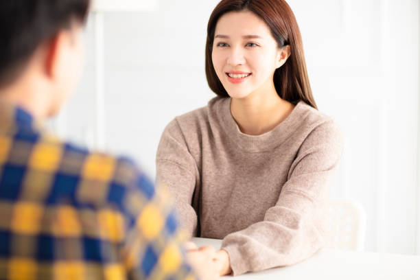 istock Happy young couple  talking and laughing 1174606720