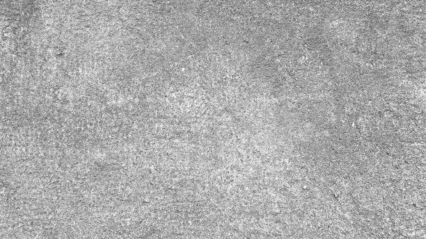 istock Grungy white concrete wall texture background. 1174610827