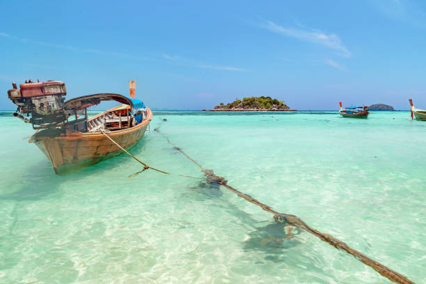 istock Long tail boat waiting for tourists in clear sky 1174611217