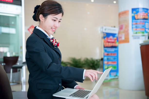 istock A Chinese bank teller and retail bank interior. 1174612794