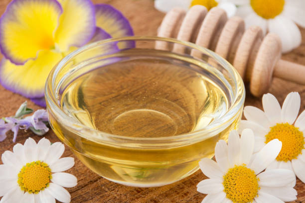 istock Honey and blossoms 1174613119