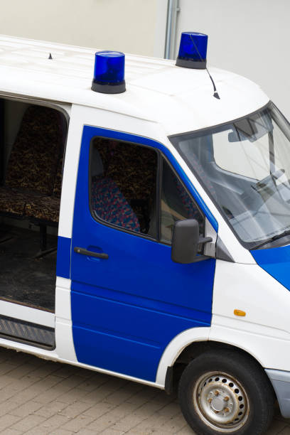 istock Police van with light bars on the street. 1174613339