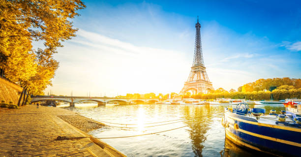 istock eiffel tour over Seine river 1174614461