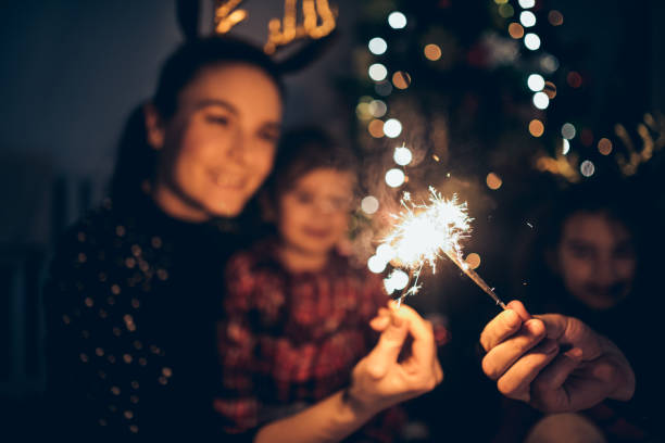 mother and daughters enjoying christmas - new year people family offspring imagens e fotografias de stock