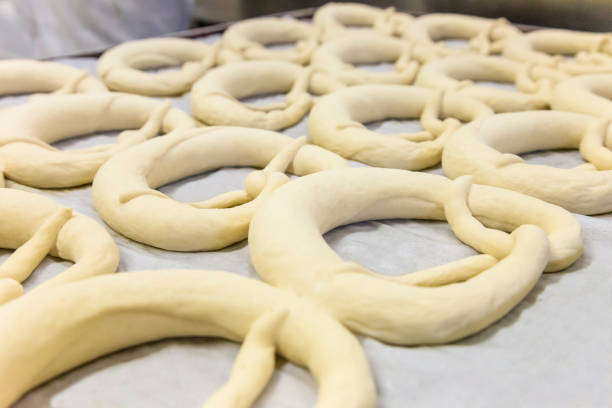 istock Unbaked pretzels on a baking sheet 1174616605