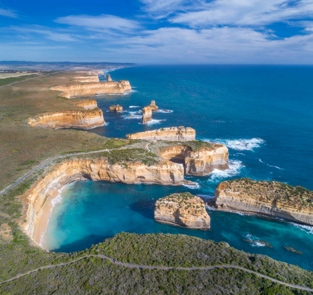 Loch Ard Gorge, Island Arch and Razorback, Great Ocean Road, Twelve Apostels, Australia Aerial of the famous Loch Ard Gorge, Island Arch and Razorback, Great Ocean Road, Twelve Apostels, Australia. Adobe RGB. Converted from RAW. great ocean road photos stock pictures, royalty-free photos & images