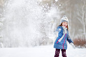 Funny little girl at winter