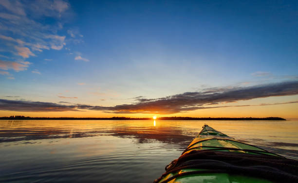 istock Sea kayak at sunset in calm water. 1174618100