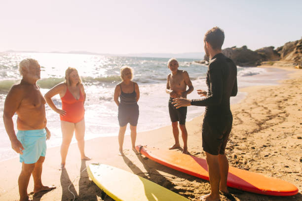 istock Surfing lessons for seniors 1174619179