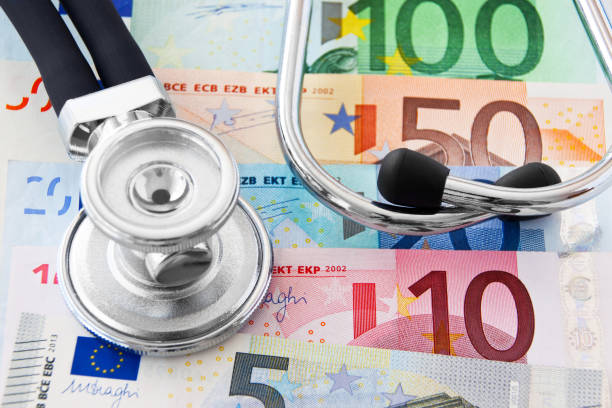 Medicine Money Medicine Money background with stethoscope recover tab stock pictures, royalty-free photos & images