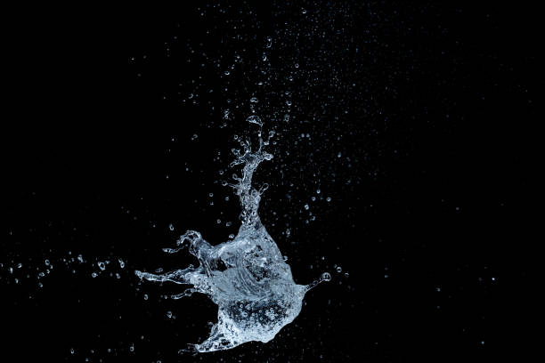 istock Water Ball on Black Background 1174630024